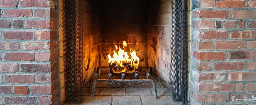 Repairing Damaged Fireplace Tiles in Port Washington, New York